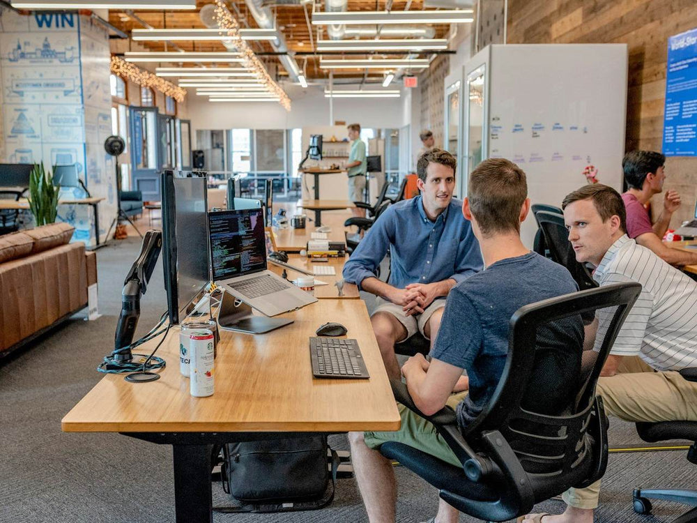 Team at a marketing agency in Milton Keynes working in an open office